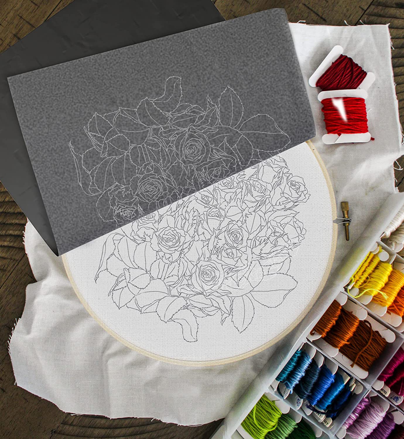 graphite paper for colorful threads and a embroidery hoop
